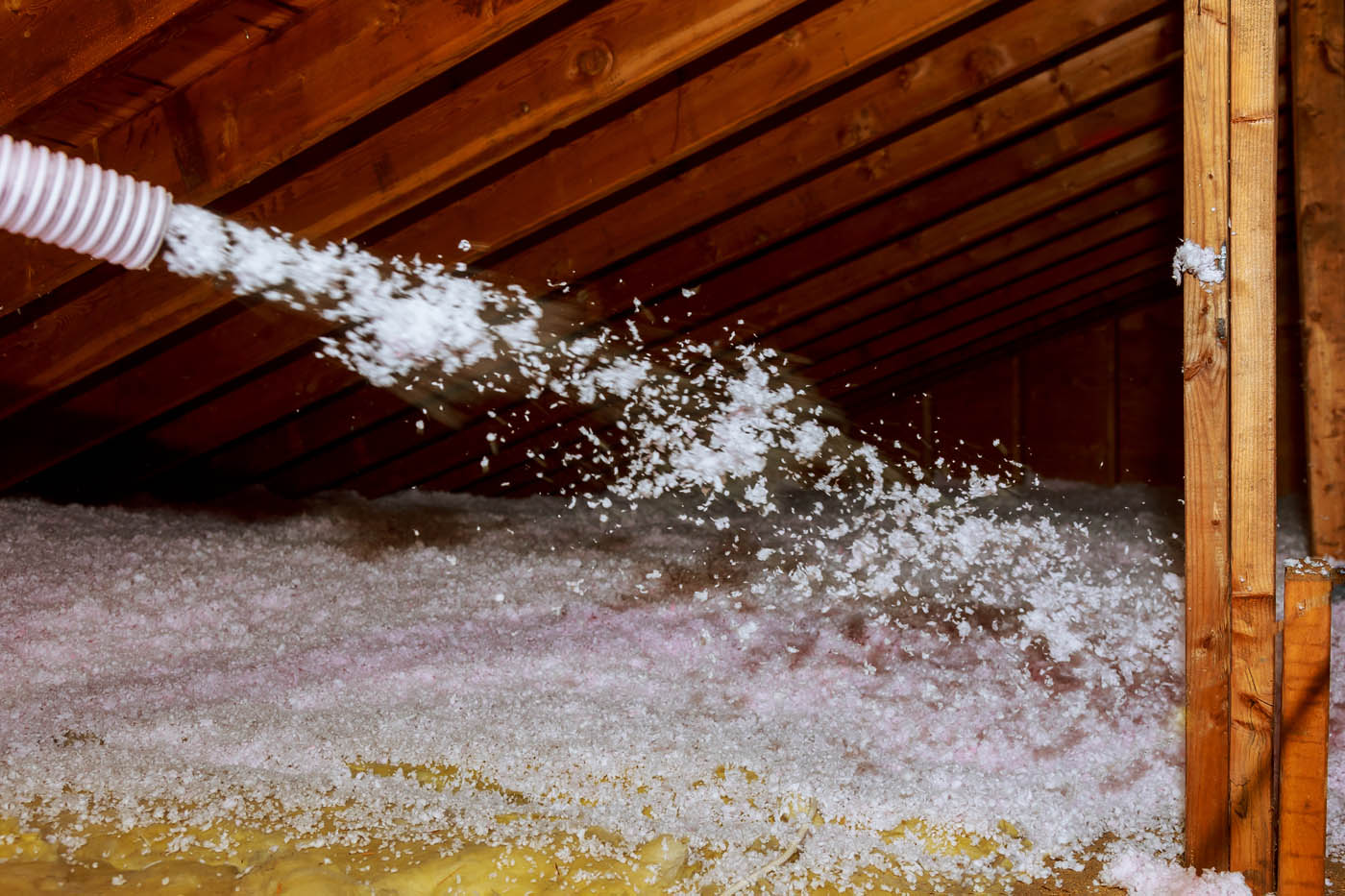 iFoam, top blow insulation companies working on an attic.